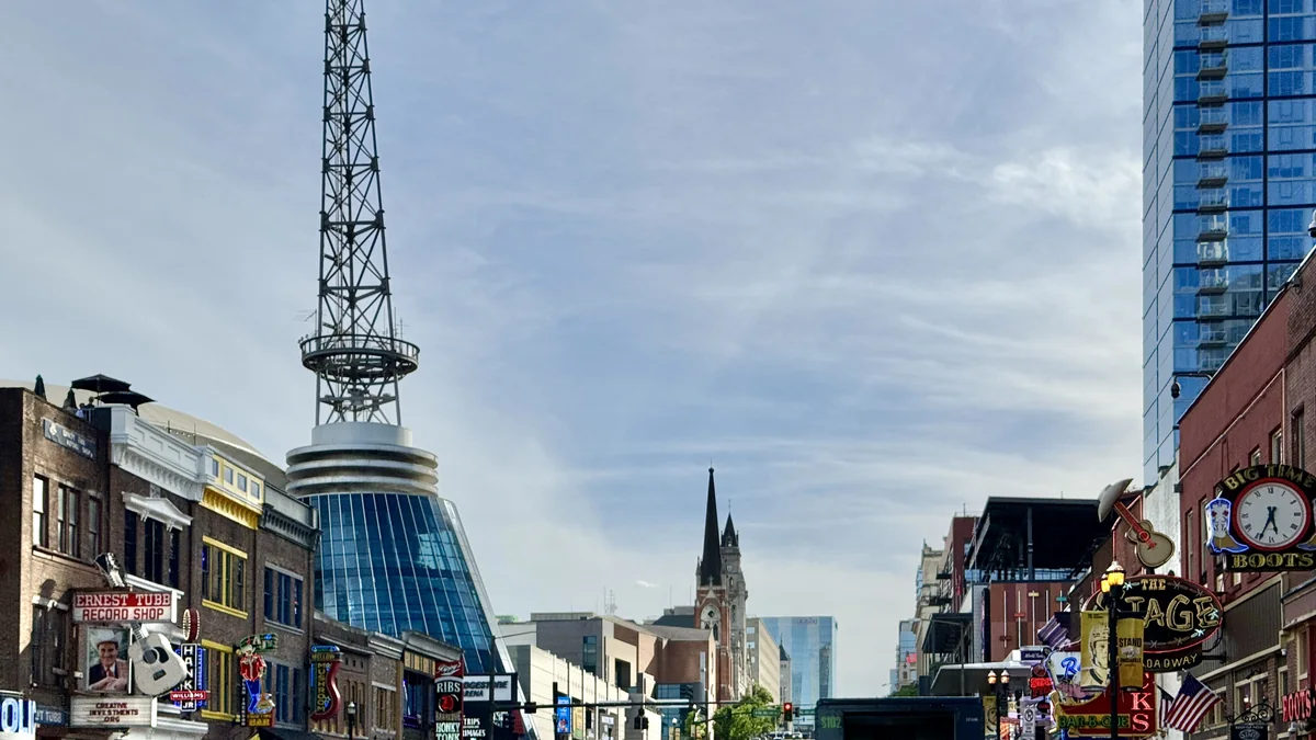 Broadway in Nashville, Tennessee with music venues and storefronts.